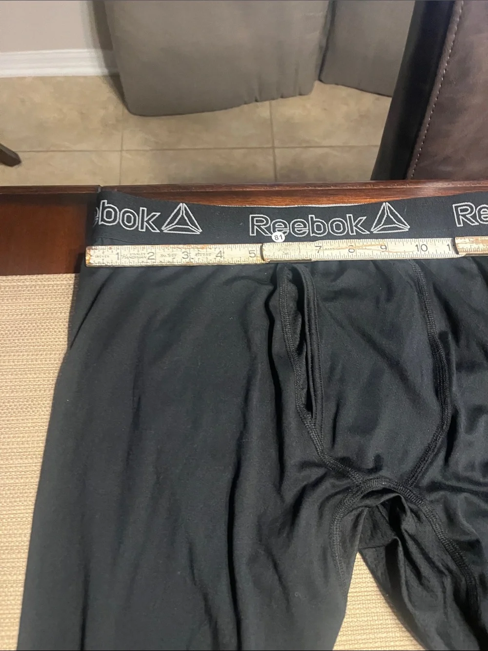 Item 81’.  Reebok Black Men's Compression Base Layer Tights long John’s large